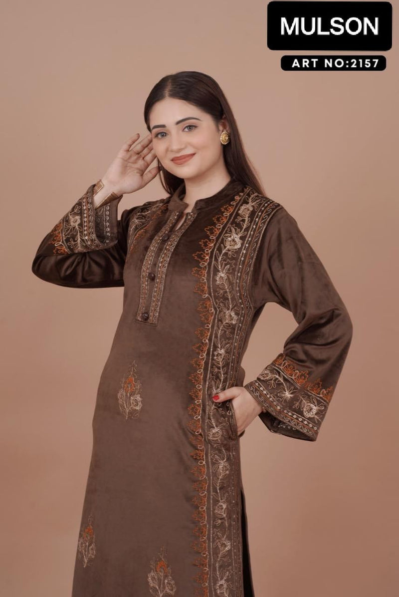 The rich plum shade enhances its appeal, while the handcrafted detailing on the neckline and sleeves ensures refined perfection. Tailored in a comfortable straight-fit silhouette, it offers both class and comfort, making it a graceful choice for win