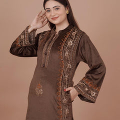 The rich plum shade enhances its appeal, while the handcrafted detailing on the neckline and sleeves ensures refined perfection. Tailored in a comfortable straight-fit silhouette, it offers both class and comfort, making it a graceful choice for win