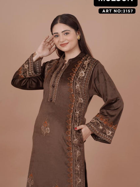 The rich plum shade enhances its appeal, while the handcrafted detailing on the neckline and sleeves ensures refined perfection. Tailored in a comfortable straight-fit silhouette, it offers both class and comfort, making it a graceful choice for win