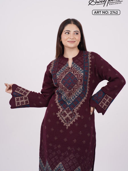 Add a touch of graceful charm to your winter wardrobe with this beautifully embroidered woollen kurti. Designed in an elegant base with intricate embroidery, this piece brings heritage craft together with