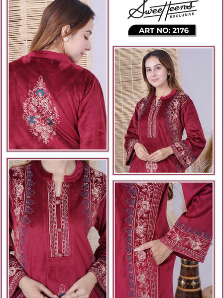 Step into elegance with our Sweetheens Exclusive Crafted from premium velvet fabric, this ensemble radiates royal sophistication and comfort. Adorned with intricate hand embroidery along the neckline, sleeves, and hem, every detail reflects