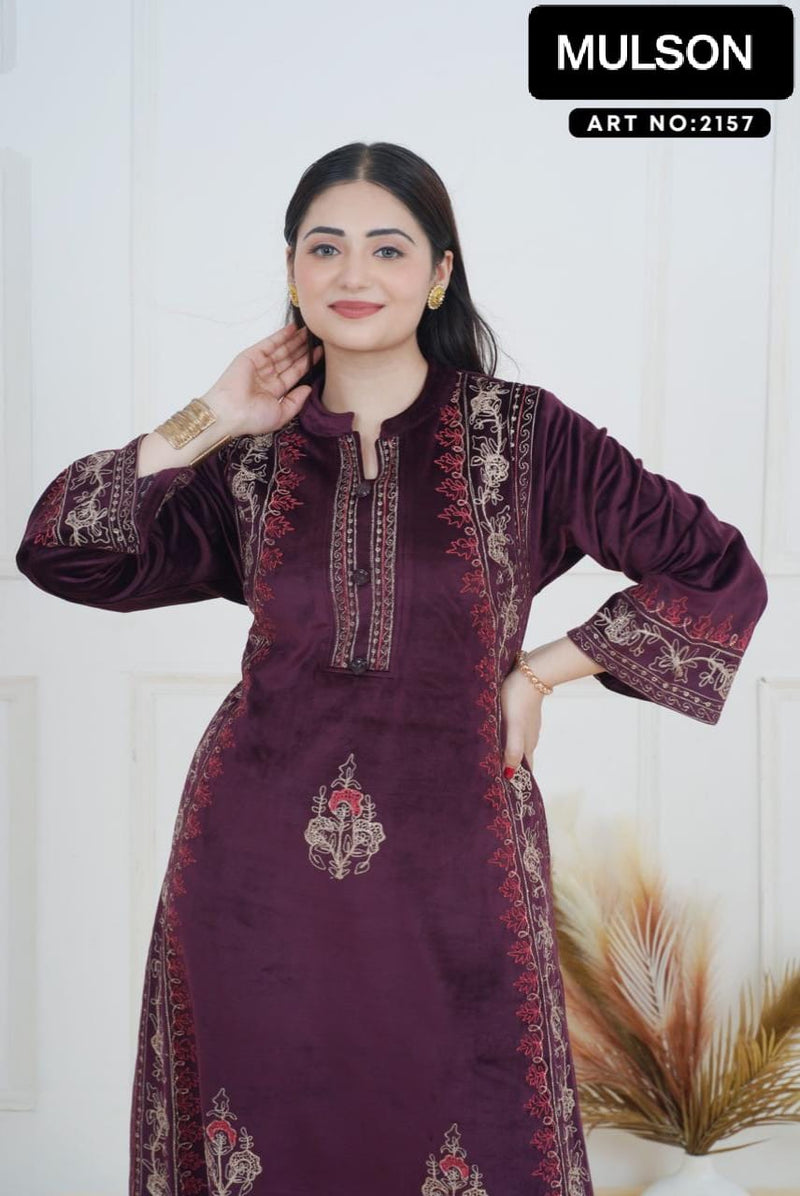 The rich plum shade enhances its appeal, while the handcrafted detailing on the neckline and sleeves ensures refined perfection. Tailored in a comfortable straight-fit silhouette, it offers both class and comfort, making it a graceful choice for win