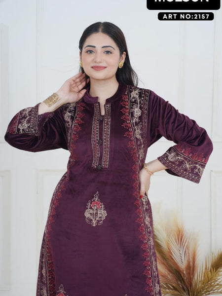 The rich plum shade enhances its appeal, while the handcrafted detailing on the neckline and sleeves ensures refined perfection. Tailored in a comfortable straight-fit silhouette, it offers both class and comfort, making it a graceful choice for win