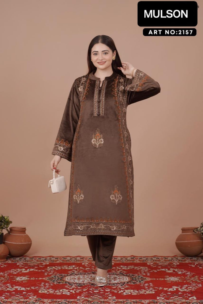 The rich plum shade enhances its appeal, while the handcrafted detailing on the neckline and sleeves ensures refined perfection. Tailored in a comfortable straight-fit silhouette, it offers both class and comfort, making it a graceful choice for win