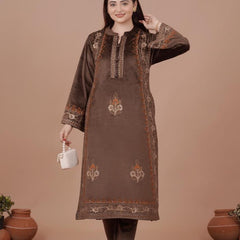 The rich plum shade enhances its appeal, while the handcrafted detailing on the neckline and sleeves ensures refined perfection. Tailored in a comfortable straight-fit silhouette, it offers both class and comfort, making it a graceful choice for win