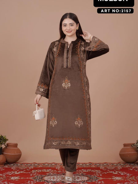 The rich plum shade enhances its appeal, while the handcrafted detailing on the neckline and sleeves ensures refined perfection. Tailored in a comfortable straight-fit silhouette, it offers both class and comfort, making it a graceful choice for win