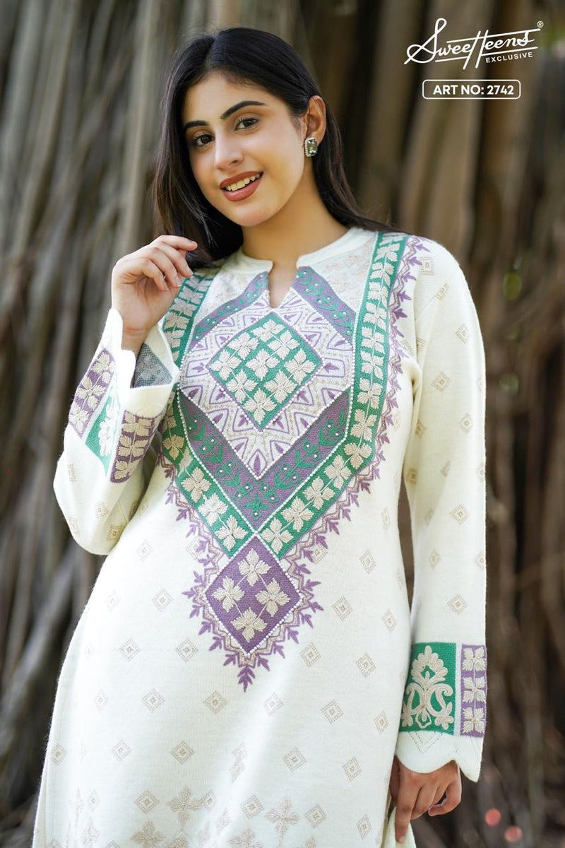 Add a touch of graceful charm to your winter wardrobe with this beautifully embroidered woollen kurti. Designed in an elegant base with intricate embroidery, this piece brings heritage craft together with
