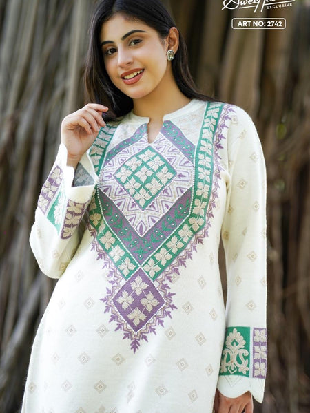 Add a touch of graceful charm to your winter wardrobe with this beautifully embroidered woollen kurti. Designed in an elegant base with intricate embroidery, this piece brings heritage craft together with