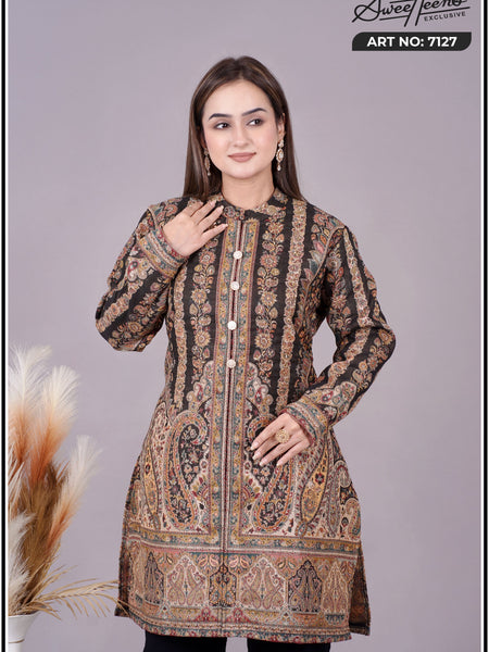 A beautifully crafted ethnic kurti featuring rich Kashmiri-inspired tapestry design in warm earthy hues. Designed with intricate detailing and a timeless silhouette, this piece brings effortless elegance to every occasion. Perfect for festive gatherings,