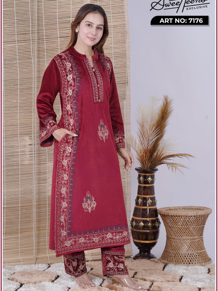 Step into elegance with our Sweetheens Exclusive Crafted from premium velvet fabric, this ensemble radiates royal sophistication and comfort. Adorned with intricate hand embroidery along the neckline, sleeves, and hem, every detail reflects