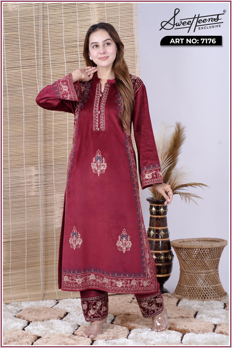 Step into elegance with our Sweetheens Exclusive Crafted from premium velvet fabric, this ensemble radiates royal sophistication and comfort. Adorned with intricate hand embroidery along the neckline, sleeves, and hem, every detail reflects