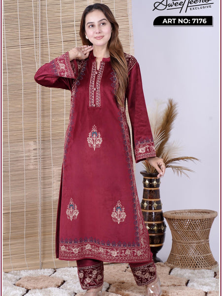 Step into elegance with our Sweetheens Exclusive Crafted from premium velvet fabric, this ensemble radiates royal sophistication and comfort. Adorned with intricate hand embroidery along the neckline, sleeves, and hem, every detail reflects