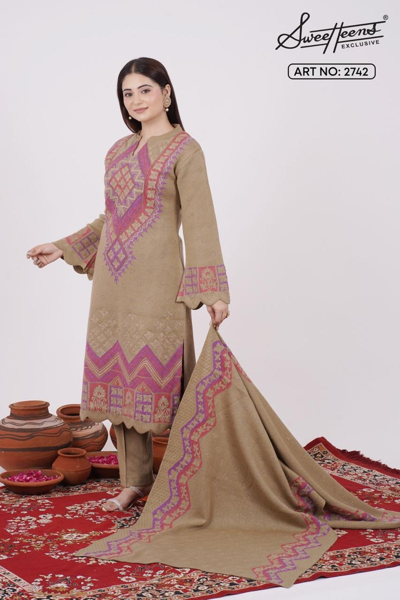 Add a touch of graceful charm to your winter wardrobe with this beautifully embroidered woollen kurti. Designed in an elegant base with intricate embroidery, this piece brings heritage craft together with