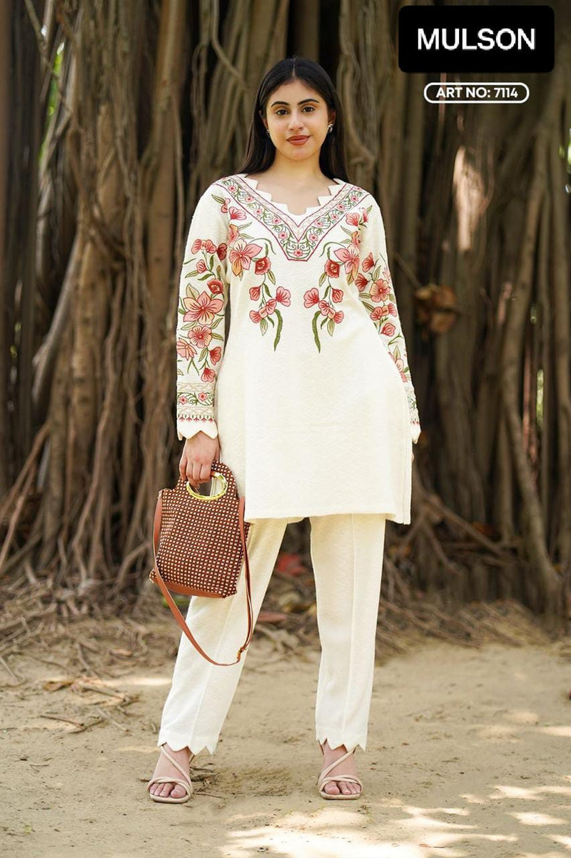 Stay effortlessly elegant with this premium embroidered winter suit in royal plum. Designed with intricate floral thread work on a warm, soft fabric – perfect for everyday comfort and festive charm.