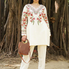 Stay effortlessly elegant with this premium embroidered winter suit in royal plum. Designed with intricate floral thread work on a warm, soft fabric – perfect for everyday comfort and festive charm.