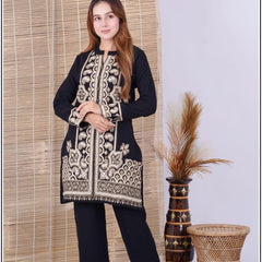 Wrap yourself in refined winter elegance with this premium wool embroidered set. Thoughtfully tailored for comfort and sophistication, this outfit features intricate hand-style embroidery that adds a luxurious ethnic charm. Perfect for graceful winter sty