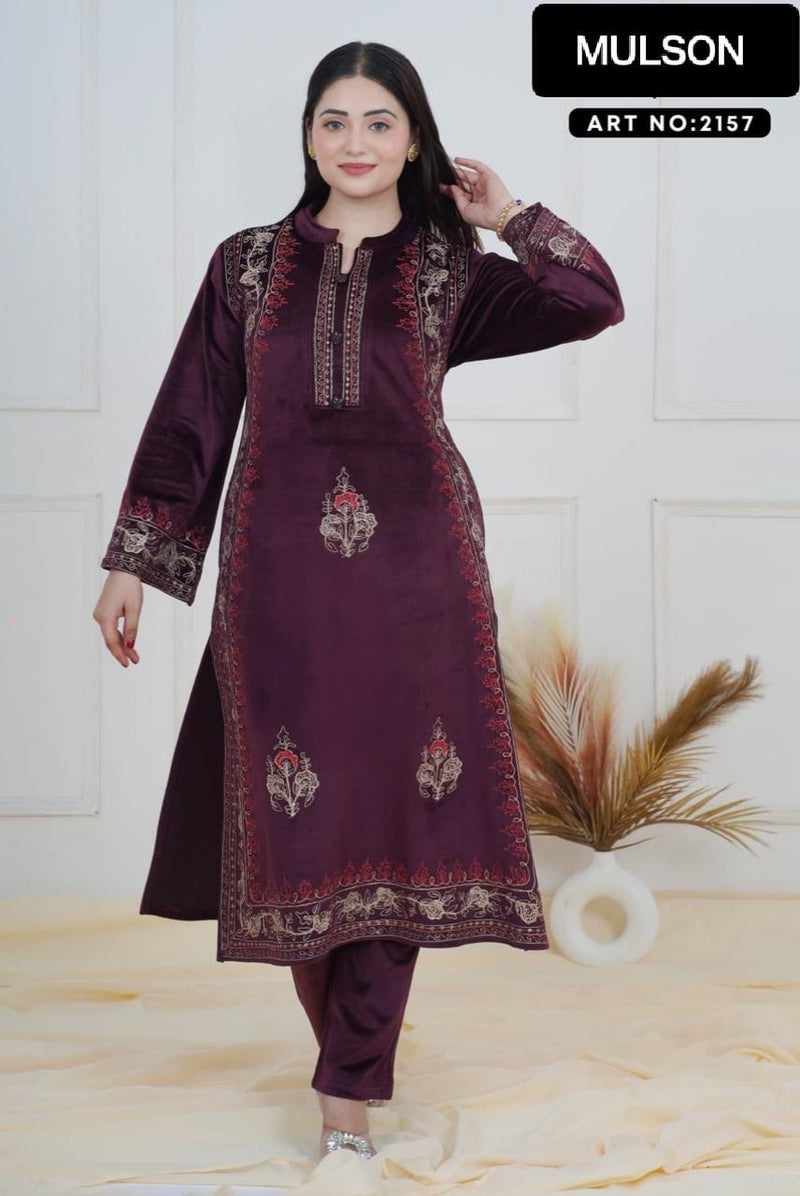 The rich plum shade enhances its appeal, while the handcrafted detailing on the neckline and sleeves ensures refined perfection. Tailored in a comfortable straight-fit silhouette, it offers both class and comfort, making it a graceful choice for win