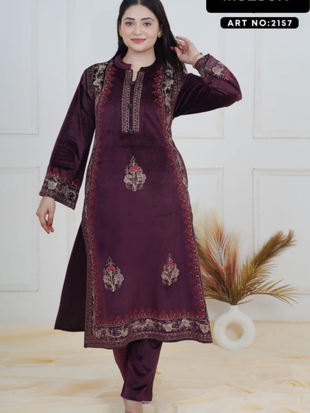 The rich plum shade enhances its appeal, while the handcrafted detailing on the neckline and sleeves ensures refined perfection. Tailored in a comfortable straight-fit silhouette, it offers both class and comfort, making it a graceful choice for win