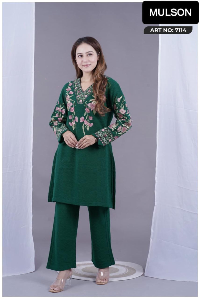 Stay effortlessly elegant with this premium embroidered winter suit in royal plum. Designed with intricate floral thread work on a warm, soft fabric – perfect for everyday comfort and festive charm.