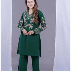 Stay effortlessly elegant with this premium embroidered winter suit in royal plum. Designed with intricate floral thread work on a warm, soft fabric – perfect for everyday comfort and festive charm.